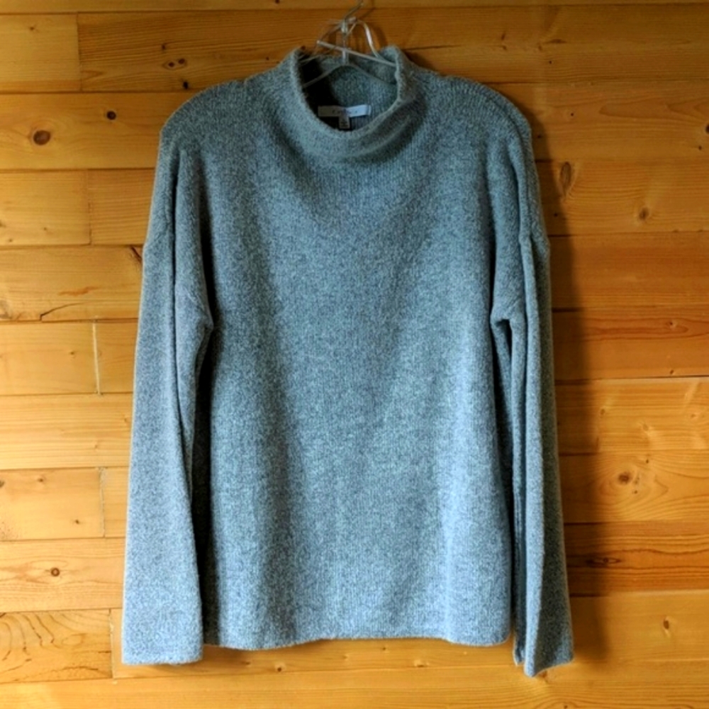 Soft grey, mock turtleneck sweater.
